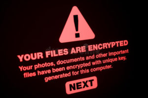 ransomware-close-up-your-files-encrypted-screen-95310554