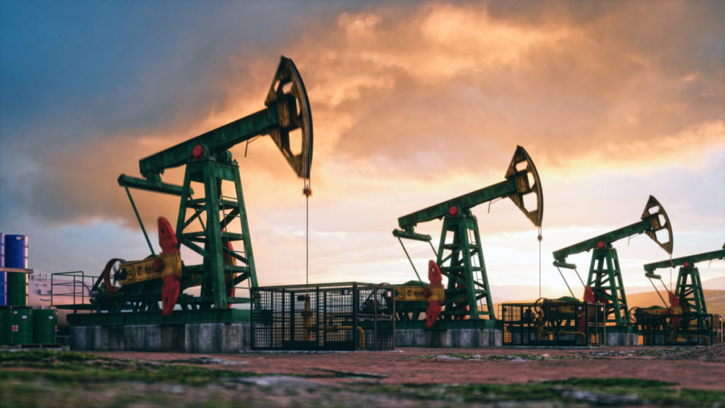 Working oil pumps are seen against a sunset sky. Intezer uncovered a year-long spear-phishing campaign against energy companies. 