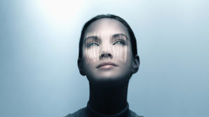 Pacific Islander woman with shadow of bar code on her face