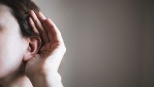 How the FBI quietly added itself to criminals’ instant message conversations 11 A woman's ear, listening