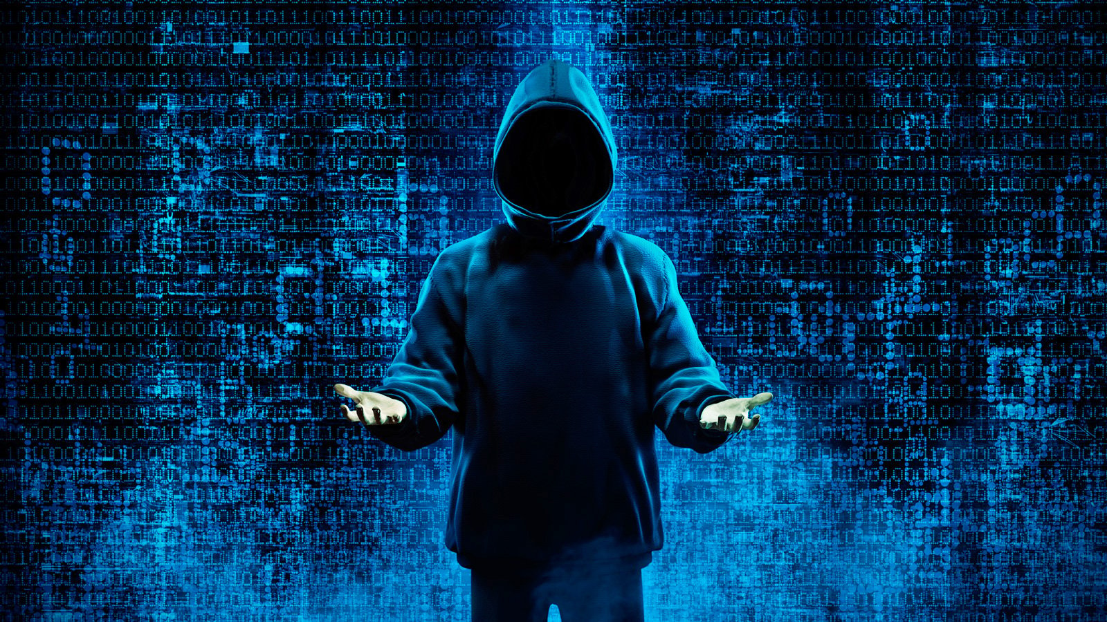 Hacker holding his hands up