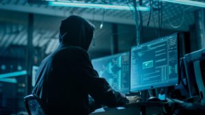 Hackers swap stealth for realistic checkout forms to steal credit cards 10 man-in-hood-typing-1