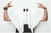 Man wearing ghost costume