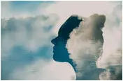 Silhouette of a woman with clouds signifying health concerns