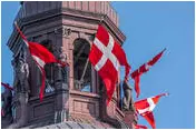 danish flags in copenhagen parliament