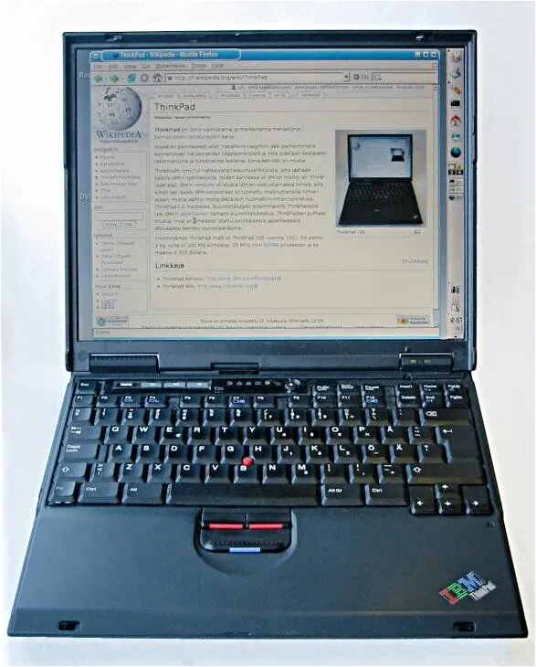 ThinkPad T20 with its scroll button below the left/right click. Image by J-P Kama, Creative Commons 3.0